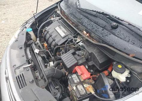 2010 Honda Insight Lx from USA, damaged, VIN JHMZE2H53AS012121